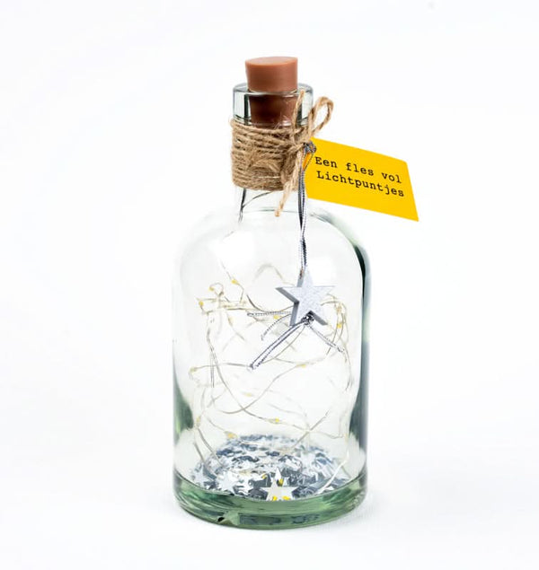 Une bouteille pleine de points lumineux