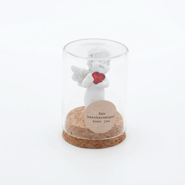 ange gardien dans une cloche de verre